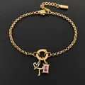 14K gold plated stainless steel bracelet with heart initial L and pink gemstone pendant - Letter T