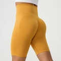 High-waisted bright yellow seamless yoga shorts with scrunch butt lifting effect - Yellow