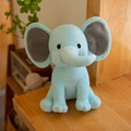 Light blue elephant plush toy with grey inner ears for baby soothing and nursery decor - Light Blue
