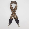 Close-up of geometric pattern woven bag strap with antique gold metal lobster clasp - Coffee Background Brown Pattern Coffee Leather [Rich Flower]