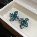 Sparkling emerald green and white zircon flower stud earrings displayed in white gift box - Black Gold Floral Style (18#)