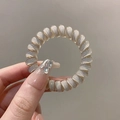 Spiral telephone cord hair tie with white stripe pattern in translucent grey finish - Single Piece / Jelly White