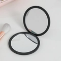 Foldable black round pocket makeup mirror with double-sided design for portable use - Black