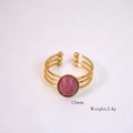 Detail of a triple-layer gold ring featuring a 12mm pink oval gemstone weighing 2.4g - Geometric Triple Ring Open Style / Rhodonite