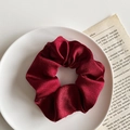 Lustrous burgundy satin scrunchie hair tie with elegant silk texture on white plate - 1076E Wine Red Satin Scrunchie