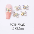 Vue macro détaillée de charmes d'ongles papillon aurora avec dimensions de 11x8,5 mm - Papillon Aurora Base Or (AM35)