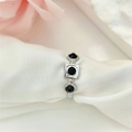 Minimalist silver geometric open ring with black crystals on white silk background - Adjustable Open / Steel Black Zirconia