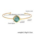 Gold stainless steel open bangle featuring a faceted sea blue Czech glass gemstone - Gold/Light Blue Stone