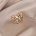 Elegant gold bow brooch with white pearls and sparkling crystal on champagne silk - 546# Bow