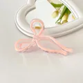 Pink bow-shaped hair claw clip in jelly pink acrylic finish with 11cm large size - Peach Pink
