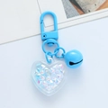 Sky blue heart-shaped acrylic keychain with colorful star glitters and small bell charm - 2.5cm Blue