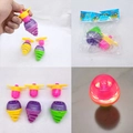 Trottola luminosa in vari colori con lanciatore ed effetto di luce a LED - Mini Giroscopio a Molla Luminoso