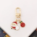 Portachiavi natalizio dorato con Babbo Natale smaltato e ciondolo regalo rosso su bianco - Babbo Natale-3 (con Palla Regalo)