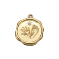 Detailed view of golden round pendant with embossed handprint, footprint and sun details - White Zirconia