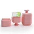 Pink silicone face ice roller massage tool set with built-in lime slice detail - Square Model - Pink