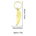 Detailed view of a golden wing pendant with dimensions of 45mm by 14mm for DIY hair decor - Wing