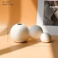 White matte ceramic vase with three connected spheres in a minimalist Nordic art style - Matte Bubble Vase C-1522