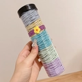 Colorful spiral telephone cord hair ties in assorted blue, yellow, and purple shades - 100 Pcs Jar / 3# Light Series