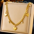 Golden chunky chain necklace with textured heart pendants and sparkling zircon accents - Radiant Heart Zircon Style (N3130)