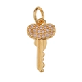 Detail of key-shaped gold charm with pink pavé heart crystal for jewelry making - Heart Key
