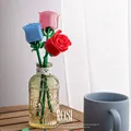 Three-piece building block rose bouquet in red, pink, and blue in a glass vase - Red Pink And Blue Rose Set Of Three / Set/With Vase