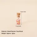 Miniature glass bottle with cork stopper and festive clay slices for DIY decor - No.119 - Christmas Theme Polymer Clay Bottle