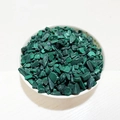 Natural malachite green crystal gravel stones in a white bowl for DIY decoration - Malachite