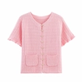 Detailed view of pink short sleeve knit cardigan with metal buttons and front pockets - S / Tops / Pink Jacket