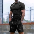 Men's black compression fitness set with white piping and breathable mesh fabric - S / Black