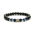 Detailed macro shot of beaded bracelet with black onyx and tiger eye stone accents - Eye