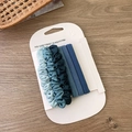 Close-up of blue gradient hair scrunchies and elastics on white display card - Scrunchie And Hair Ring Set / Blue Set