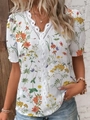 Detail of V-neckline with delicate white lace trim and colorful floral print pattern - S / White with Orange Floral