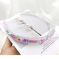 Detail of transparent PVC headband with colorful shell sequins and anti-slip inner teeth - Sequin Shell Style