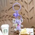 Purple cartoon mouse keychain featuring a liquid glitter backpack charm with bell - Purple Mouse Milk Bean