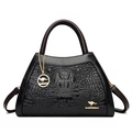 Black crocodile embossed leather handbag with golden kangaroo logo and top handles - Black