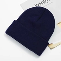 Close-up of navy blue knitted beanie hat with soft ribbed texture and folded cuff. - One Size / Navy Blue