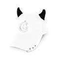 Close-up of white baseball cap with black demon horns and silver moon star charms - Moon White