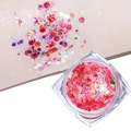 Pink glitter gel with hexagon and star sequins shown with skin swatch effects - Iridescent Red
