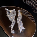 Elegant silver tassel drop earrings with sparkling rhinestones and crystal detail - Silver Rhinestone Asymmetric (Silver Earring Post)