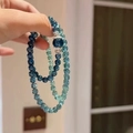 Double-layer crystal bracelet featuring gradient blue and teal beads with silver charm - Blue/Double Loop Beads