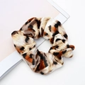 Leopard print velvet scrunchie for women hair styling on white magazine background - Style 2 Leopard Print