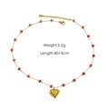 Elegante collana in acciaio inossidabile placcato oro 14K con perle rosse e cuore - N4 Quarzo Fragola