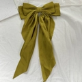 Olive green satin hair clip with large double-layered bow and long ribbon straps - Turmeric