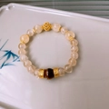 Handmade beaded bracelet with yellow citrine beads and a brown tiger eye stone - 55# Pale Hollow Flower