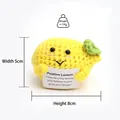 Detail view of handmade crochet lemon toy with inspirational card measuring 5cm in width - Lemon + P Card