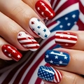 Independence Day nail art with red white stripes and blue stars patterns on manicured nails - Classic Stars and Stripes Style (CW497)