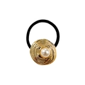 Detailed macro view of black elastic hair tie with golden spiral metal charm and white pearl - Spiral Pearl Round Gold