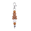 Detail of silicone beaded keychain with brown bear charm and metal spring clasp - Light Coffee
