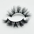 Macro shot of 20mm thick curly faux mink eyelashes with fluffy layered texture on white - B57-20F