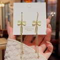 Long gold tassel earrings with cat-eye stone bow and sparkling crystals on S925 silver studs - Gold Cat's Eye Bowknot Tassel